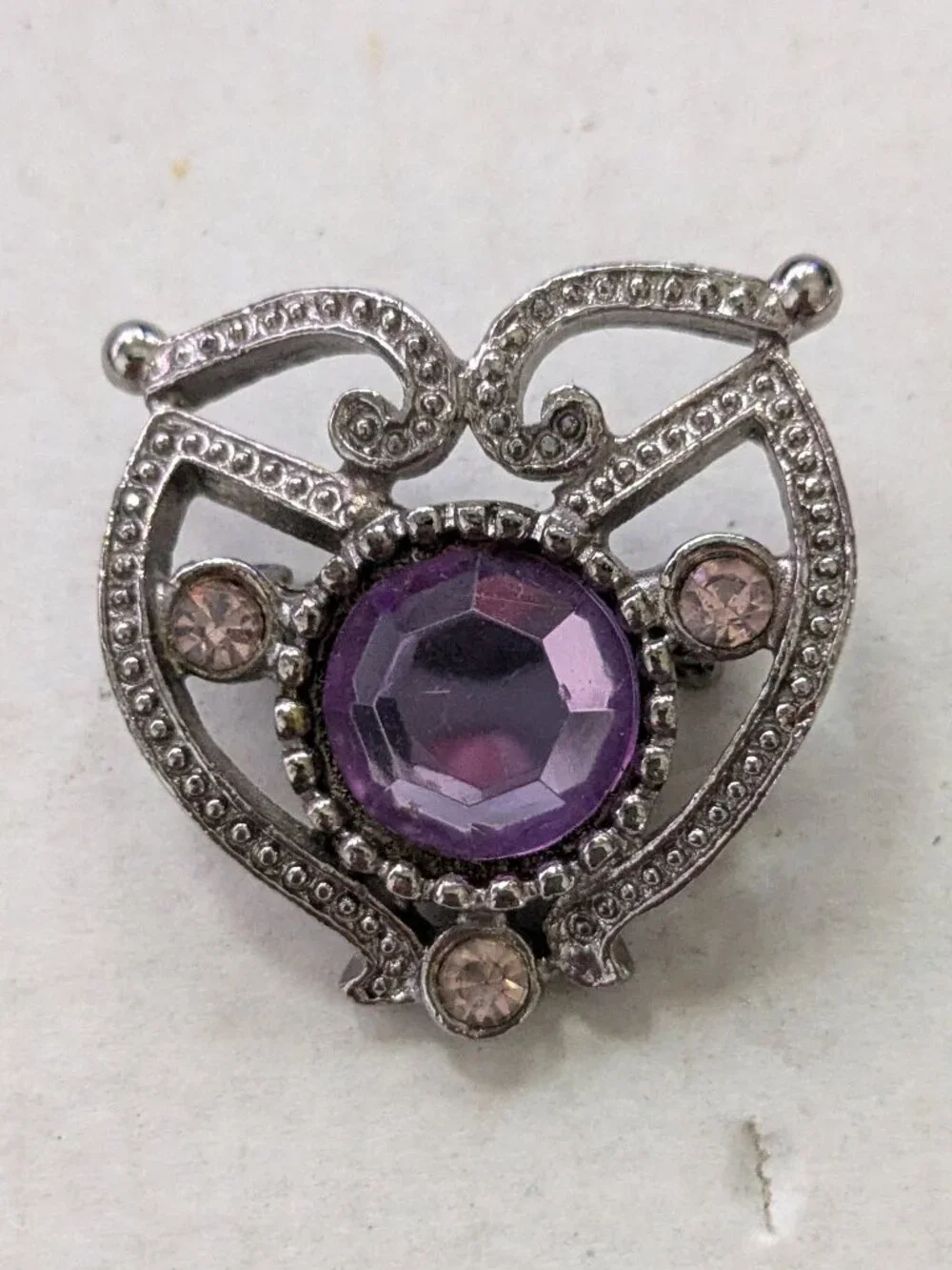 Small Silver Tone Purple Faceted Rhinestone Filigree Brooch Pin